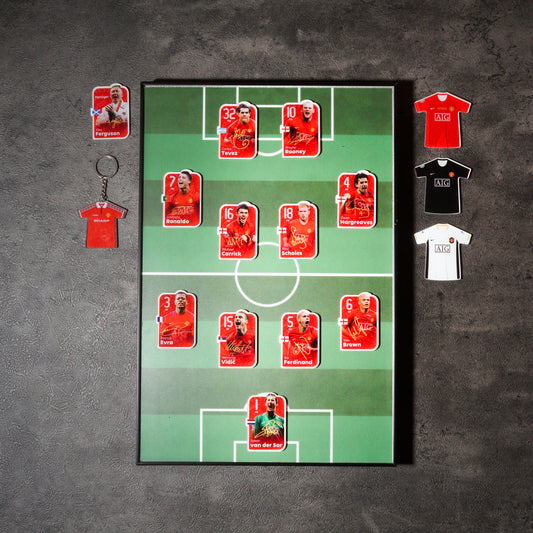 Manchester United 2008 starting-lineup magnets on a green pitch display with shirt designs